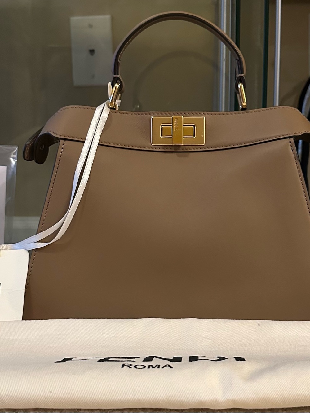 Pre-Owned Fendi Taupe Leather Peekaboo-Style Satchel with Gold Hardware.